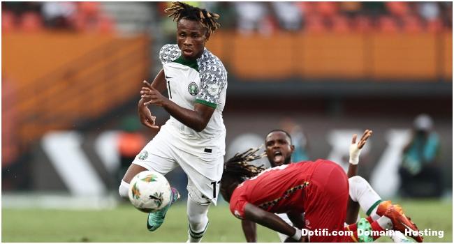 Nigeria's forward #11 Samuel Chukwueze (L) runs with the ball during the Africa Cup of Nations (CAN) 2024 group A football match between Guinea-Bissau and Nigeria at the Felix Houphouet-Boigny Stadium in Abidjan on January 22, 2024.