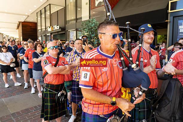 Scotland fans play bagpipes