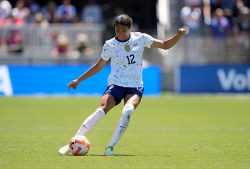 SAN JOSE, CALIFORNIA - JULY 09: Alana Cook #12 of the USA Women's National Team passes the ball up field against the Wales National Team in the second half of the Send Off Match at PayPal Park on July 09, 2023 in San Jose, California. (Photo by Thearon W. Henderson/Getty Images)